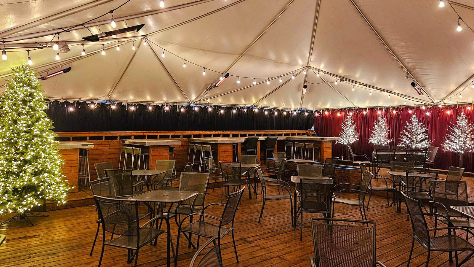 a white plate topped with a salad covered in shrimp